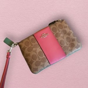 Brand new pink and brown Coach wristlet